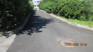 Асфальтирование внутридворовой территории на Гостилицкой ул., д.5,7