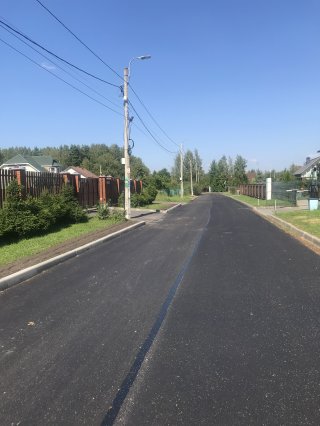 Завершился ремонт дорожного покрытия на улице Баушевской.